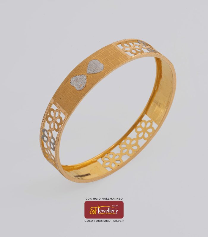 Lightweight gold bangle with heart motif and floral cutwork design – elegant gold jewellery by ST Jewellery Manufacturers Thrissur Kerala