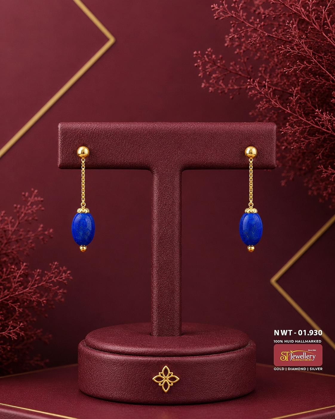 Elegant gold drop earrings featuring polished gold ball studs, delicate chain links, and vibrant royal blue oval gemstone beads, perfect for festive and everyday wear.
