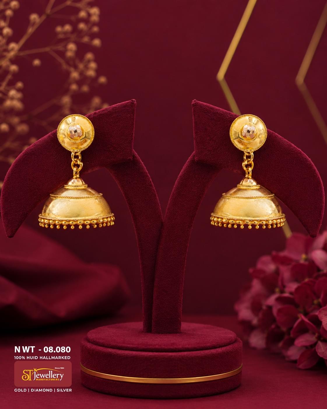 Classic plain gold jhumka earrings with polished dome design, handcrafted traditional South Indian gold jewellery featuring elegant gold bead detailing.