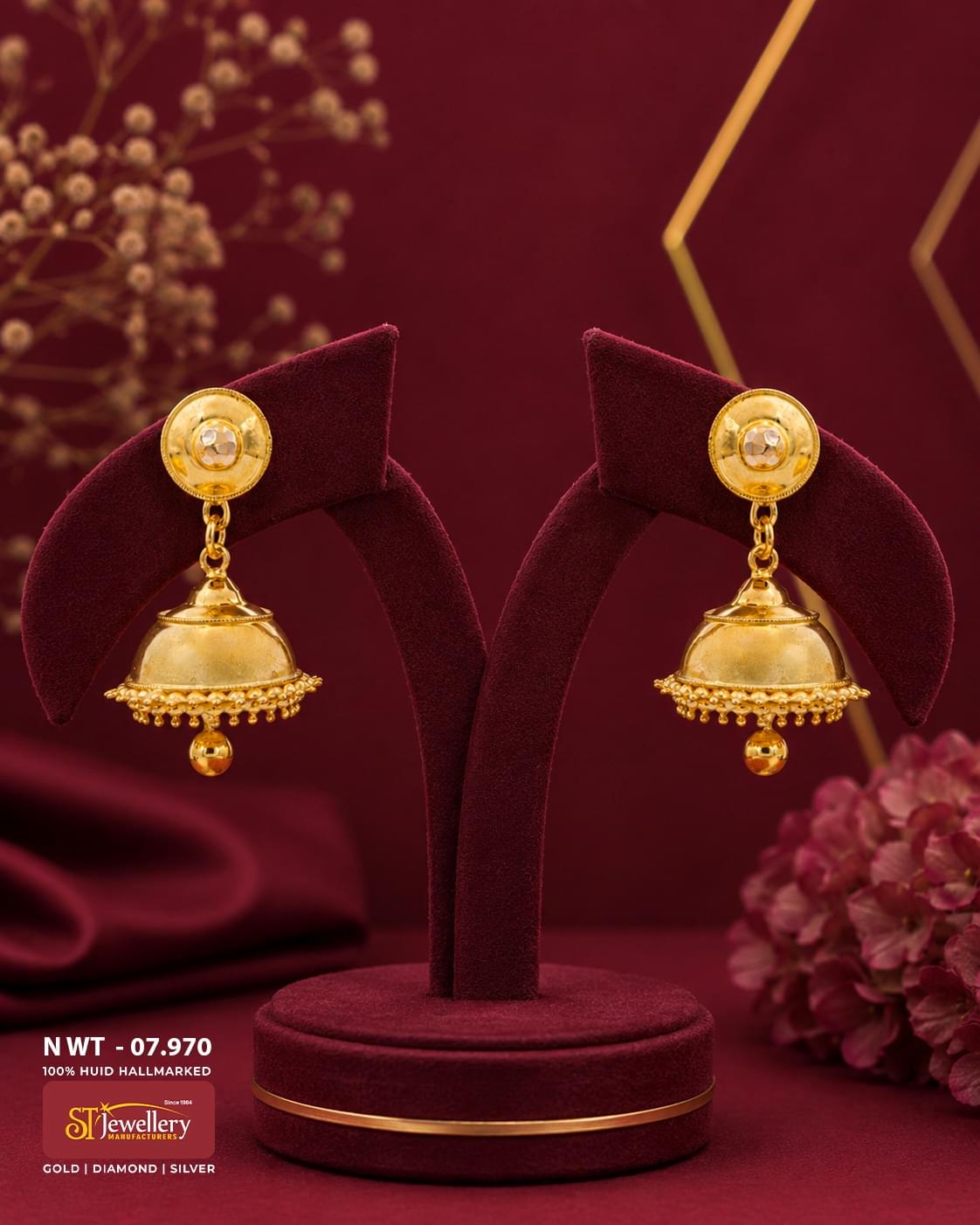 Classic plain gold jhumka earrings with polished dome design, handcrafted traditional South Indian gold jewellery featuring decorative bead fringe and elegant hanging gold drop.