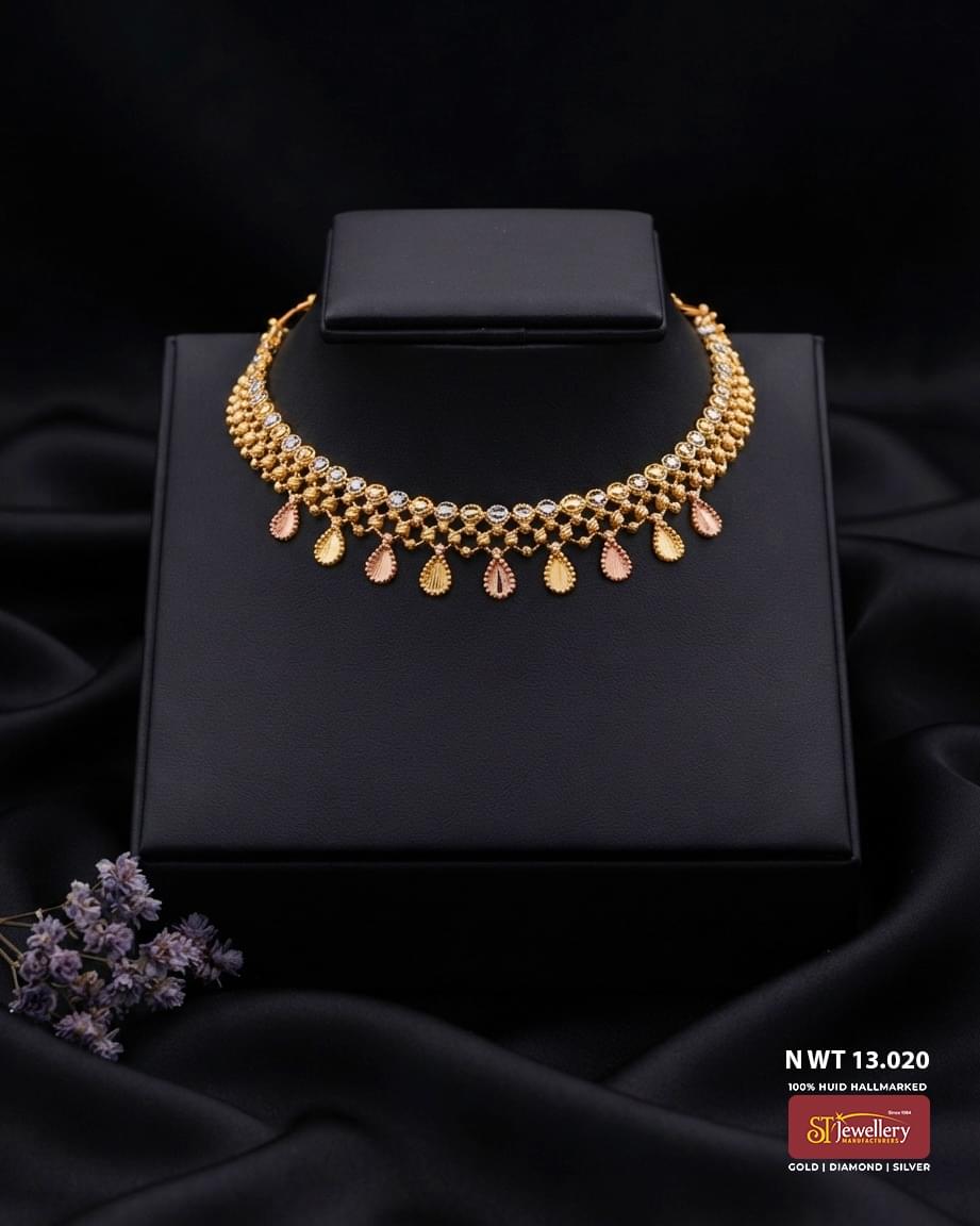 Lightweight gold necklace with sparkling white stone detailing and elegant rose gold and yellow gold teardrop motifs for women.