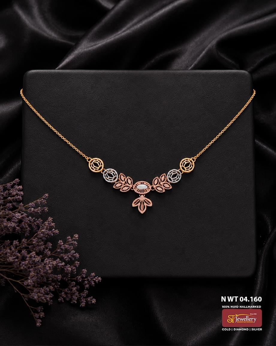 Lightweight gold necklace for women with elegant rose gold and white gold floral leaf motifs and a delicate drop design.