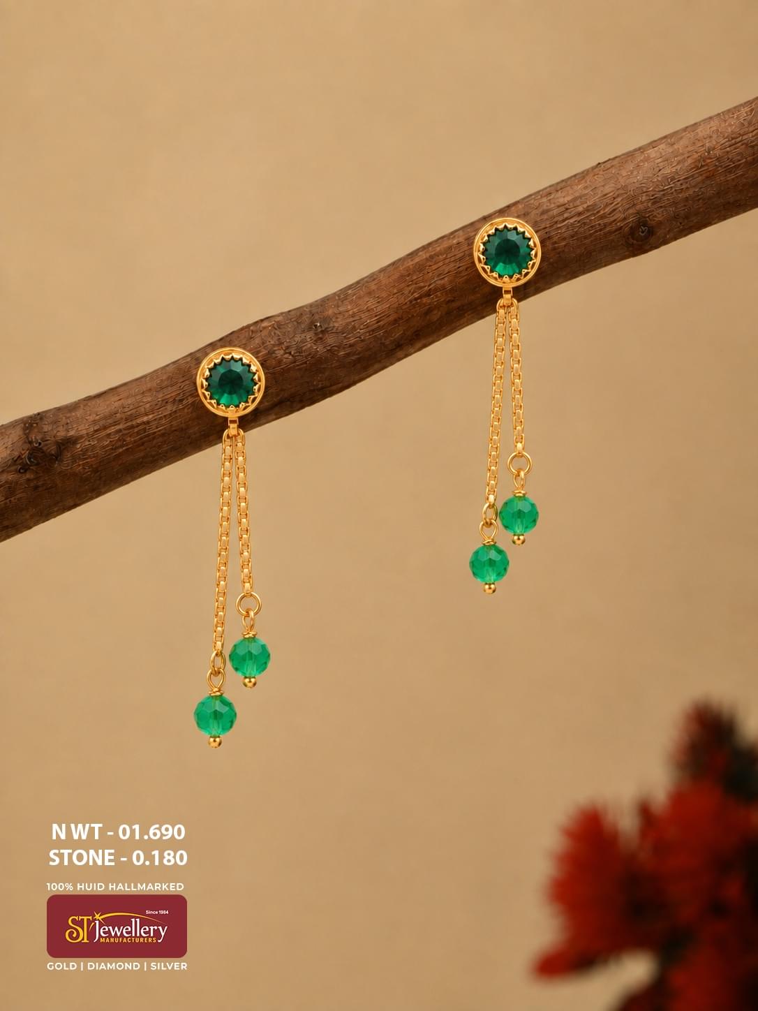 Lightweight gold chain drop earrings with round green stone studs and faceted green bead drops.