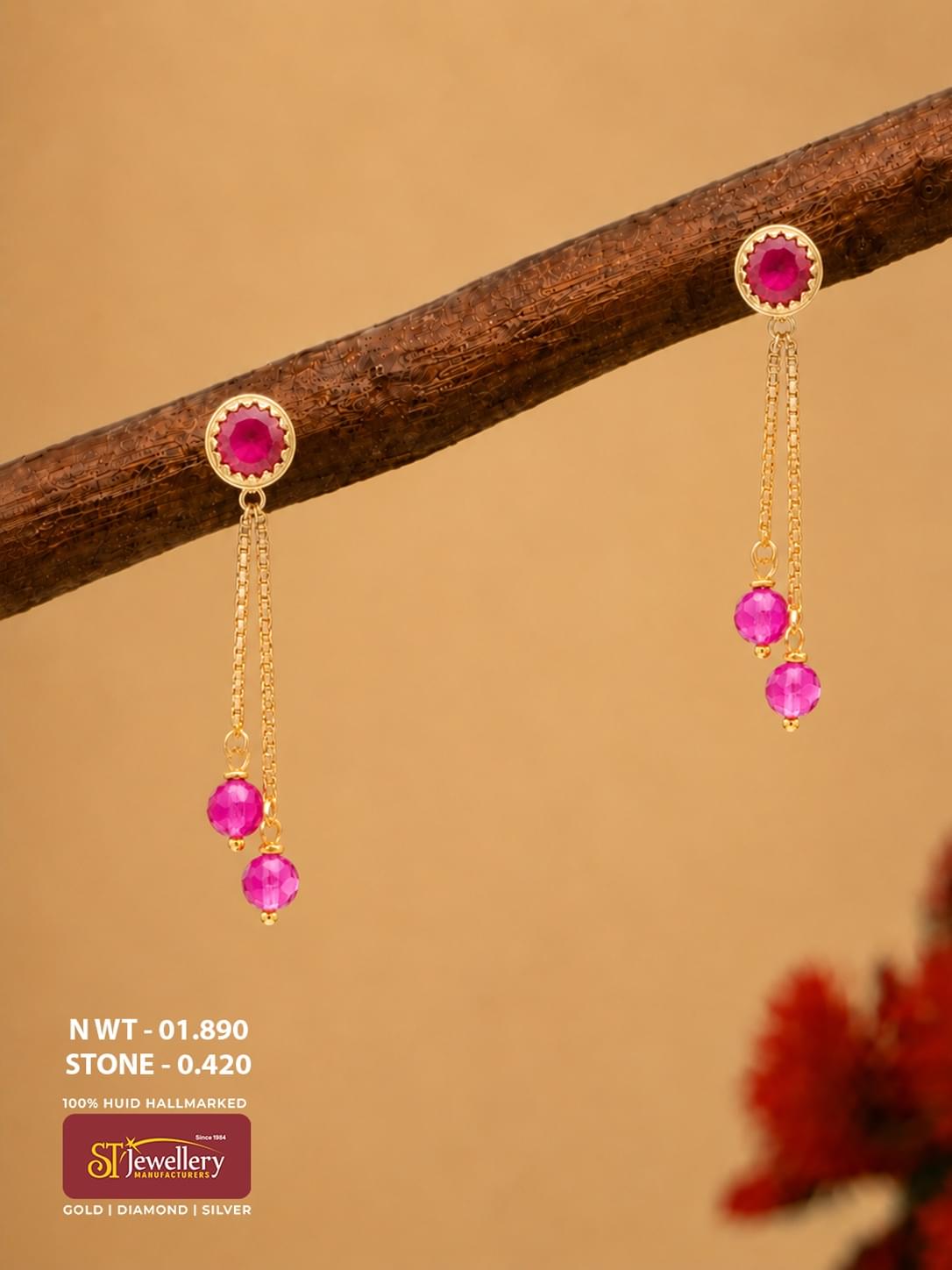 Lightweight gold chain drop earrings with vibrant pink round stones and double faceted pink bead drops.
