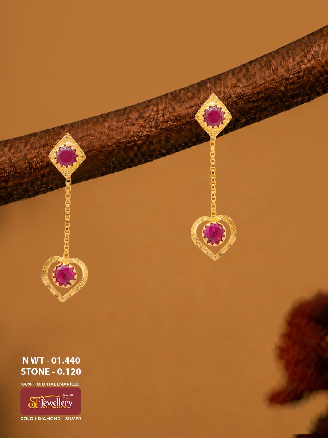 Lightweight gold chain drop earrings with pink stones and heart-shaped gold hanging design for women.