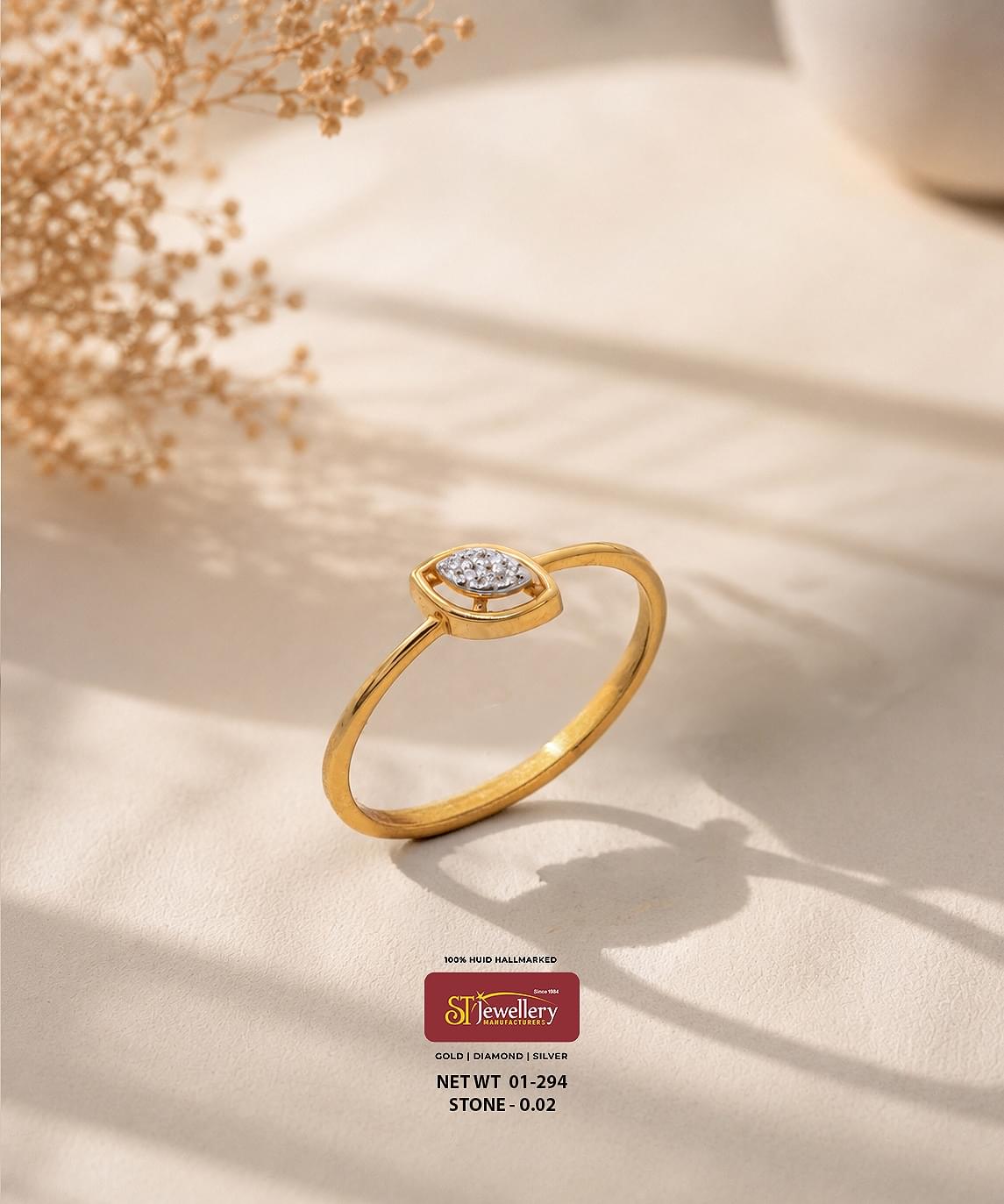 Lightweight gold ring for women featuring a delicate marquise-shaped design with sparkling white stones, ideal for elegant daily wear.