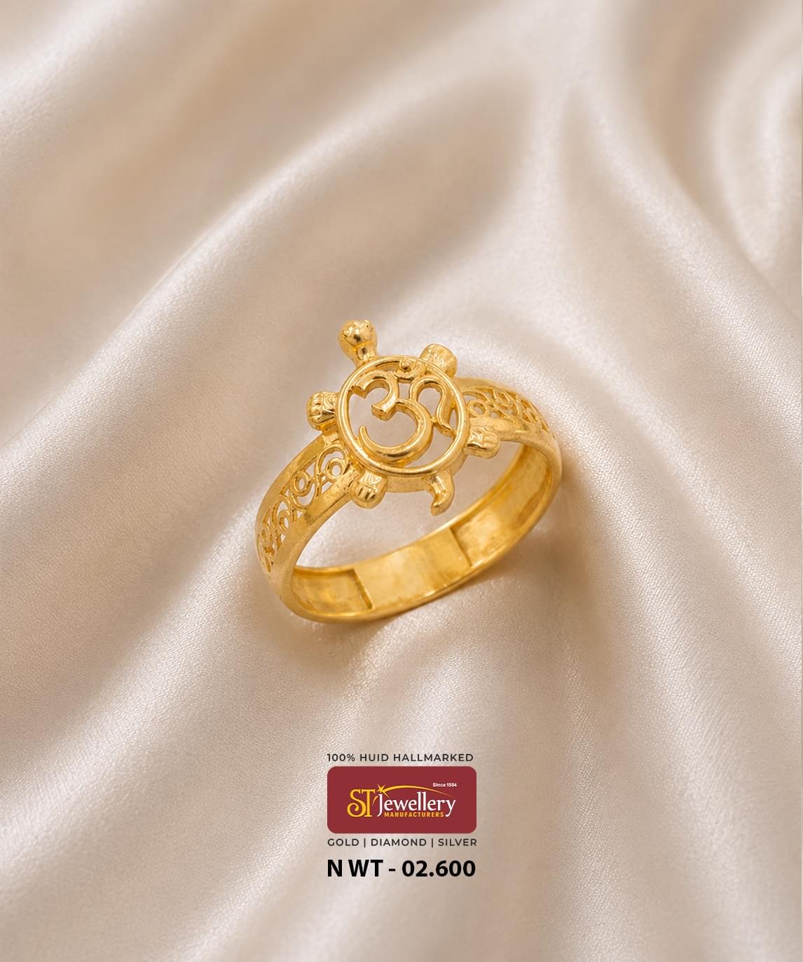 916 HUID hallmarked gold ring featuring a prominent Om symbol in a circular centerpiece with intricate openwork detailing on the band.