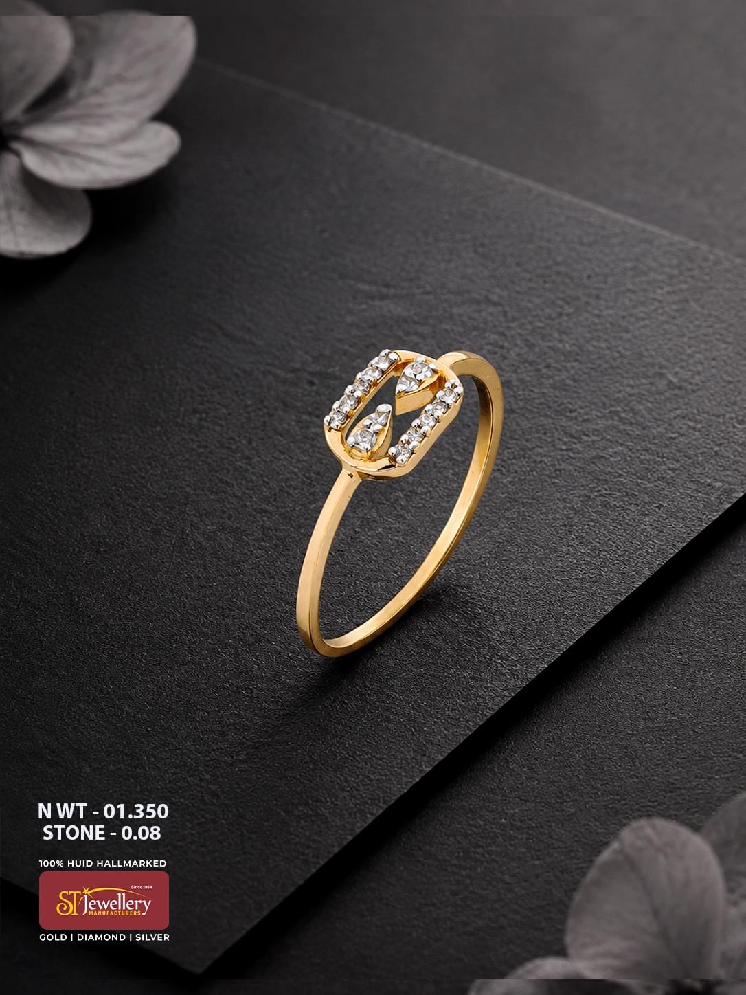 916 HUID hallmarked yellow gold ring featuring an elegant oval openwork design accented with sparkling white stones and teardrop details.