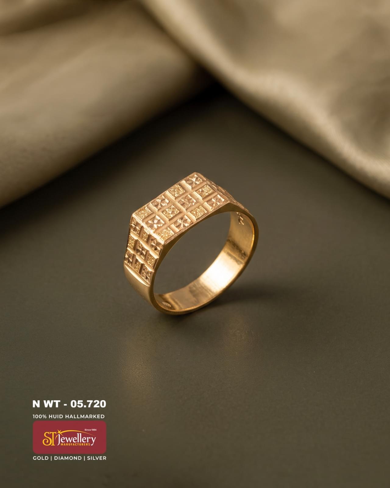 Men’s gold ring with a broad rectangular top and intricate geometric engraved design, ideal for traditional and daily wear.