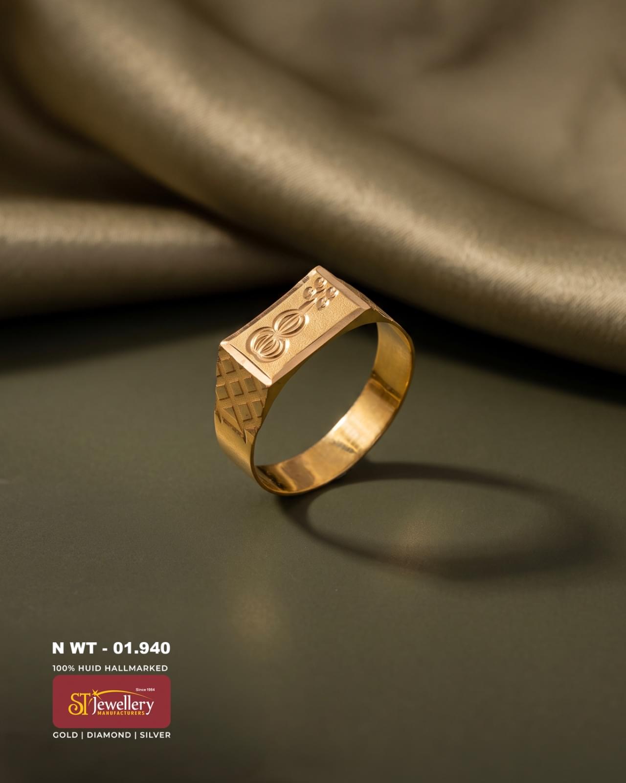 Men’s gold ring with a rectangular top, elegant engraved motif and geometric side detailing, suitable for daily and traditional wear.